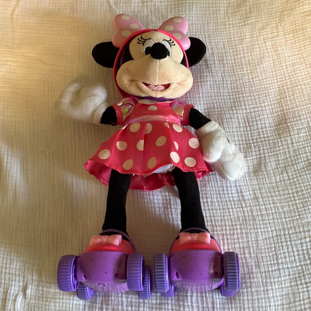 Roller skating Minnie Mouse, talking light up doll.